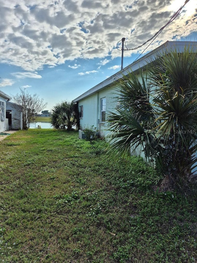 view of yard with a water view