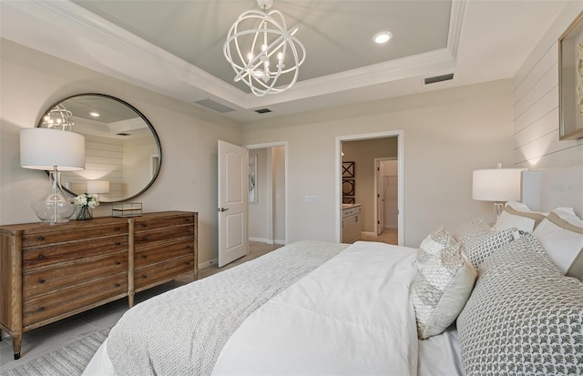 tiled bedroom with a raised ceiling, ornamental molding, and an inviting chandelier