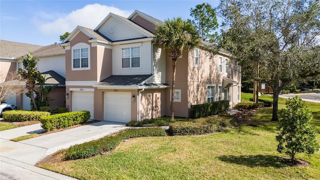 view of front of home featuring a garage and a front lawn