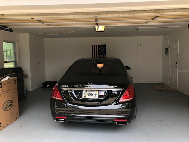 garage featuring a garage door opener