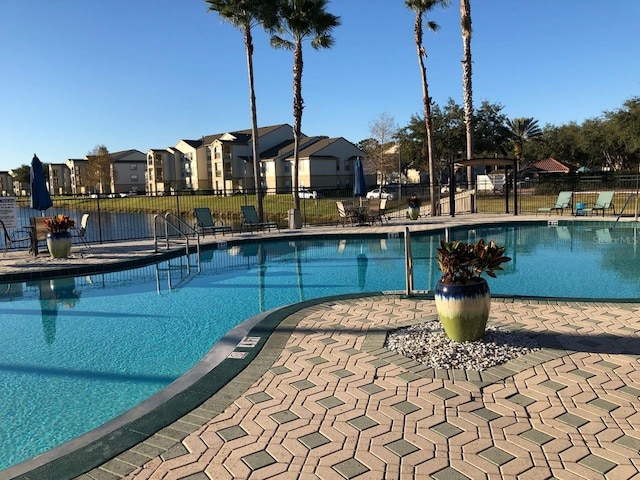 view of pool featuring a patio area