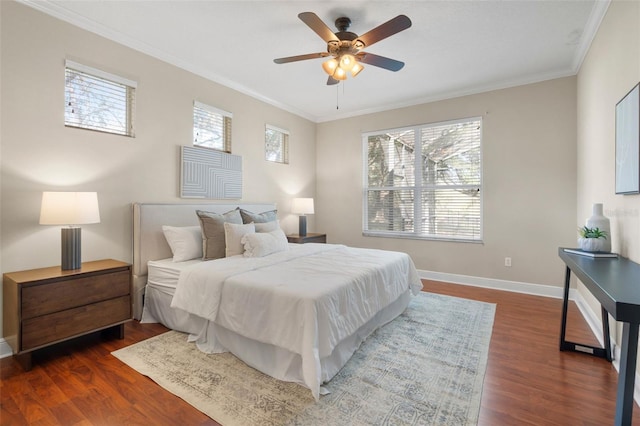 bedroom with dark wood-type flooring, ceiling fan, crown molding, and multiple windows