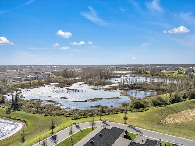 drone / aerial view featuring a water view