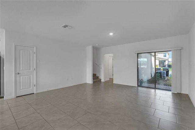 view of tiled spare room