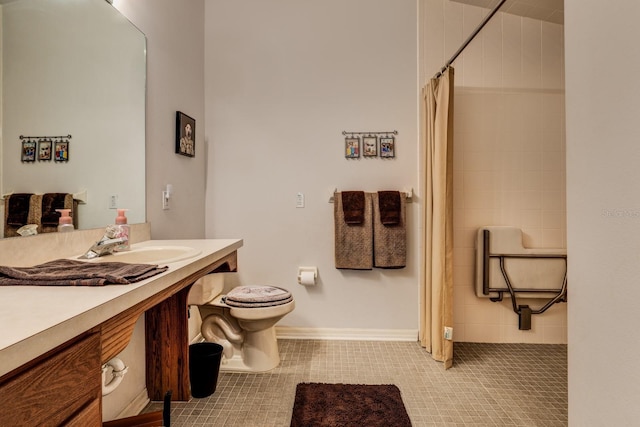 bathroom with vanity, a shower with curtain, toilet, and tile patterned floors