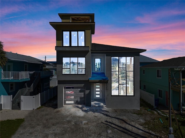 view of front of home featuring a garage