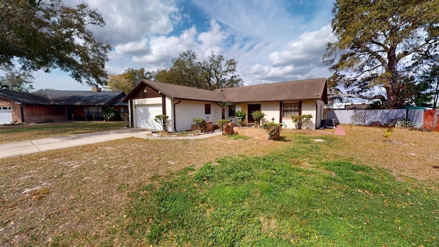 ranch-style house with a garage and a front lawn