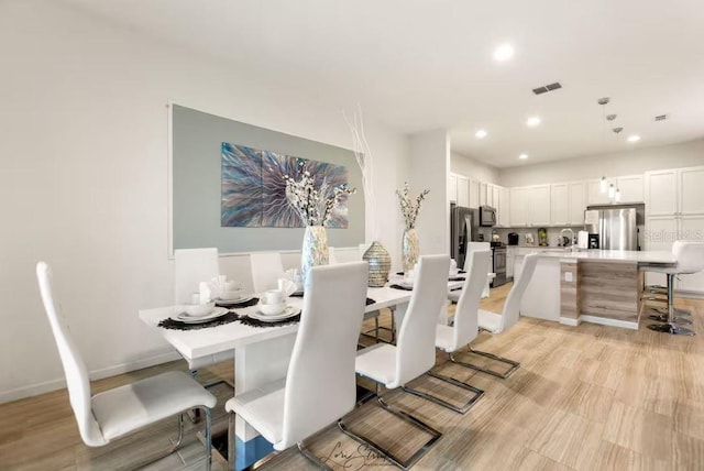 dining space with sink