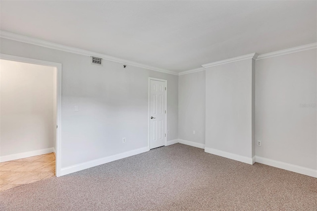 carpeted spare room with ornamental molding