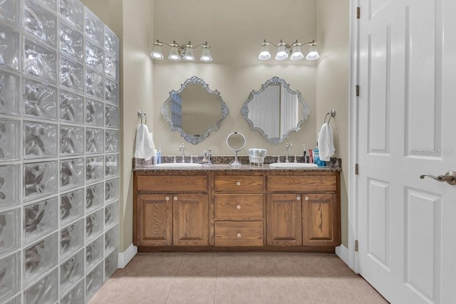 bathroom with vanity and tile patterned floors