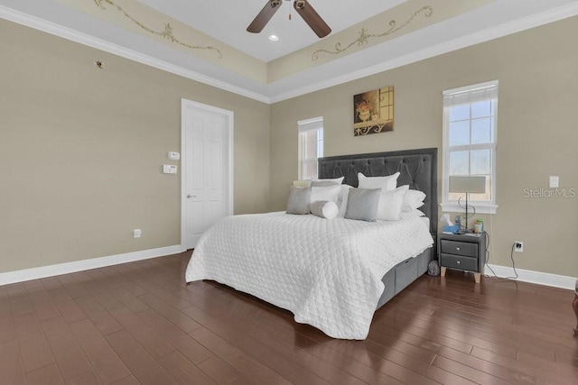 bedroom with multiple windows, ornamental molding, and dark hardwood / wood-style flooring