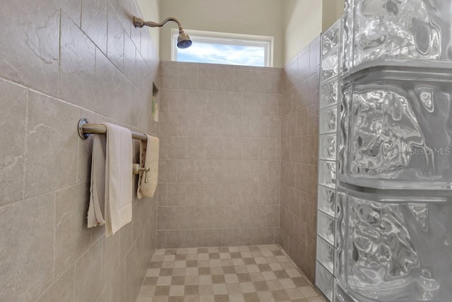 bathroom featuring tiled shower