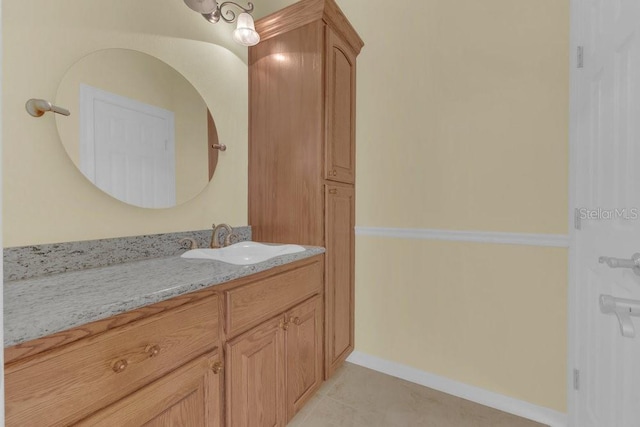 bathroom with vanity and tile patterned floors