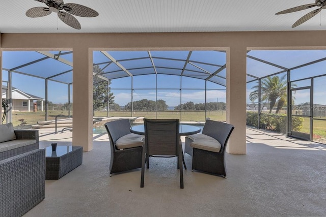 view of patio / terrace with a lanai, an outdoor hangout area, and ceiling fan