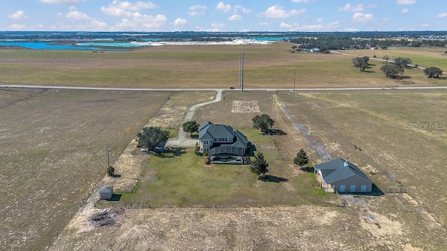 aerial view featuring a water view and a rural view