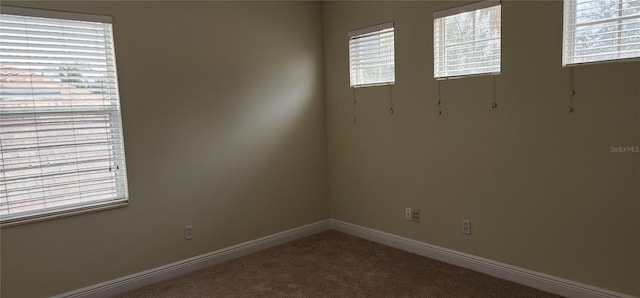 view of carpeted spare room