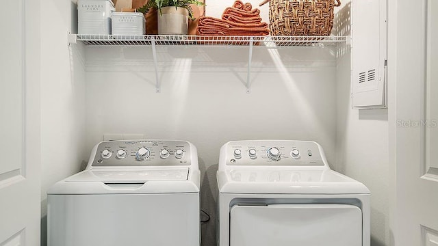 washroom featuring washer and dryer