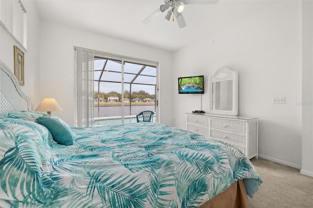 carpeted bedroom with access to outside and ceiling fan