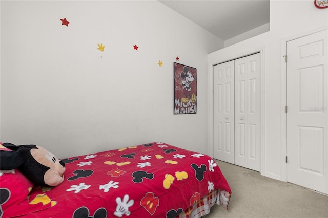 carpeted bedroom featuring a closet