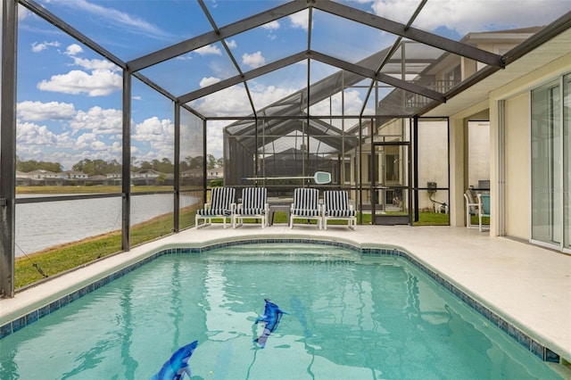 view of swimming pool with a water view, a patio area, and a lanai