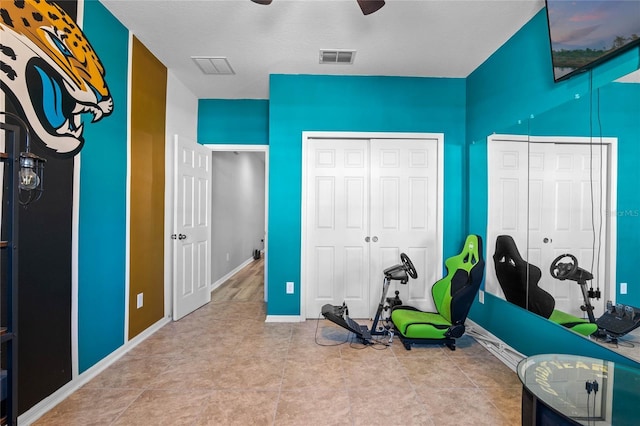 game room with ceiling fan