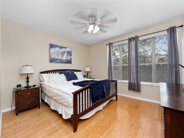 bedroom featuring ceiling fan and light wood-type flooring