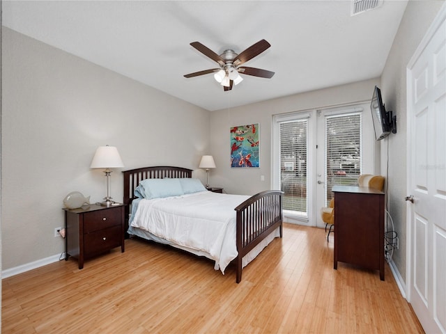 bedroom with ceiling fan, access to exterior, and light wood-type flooring