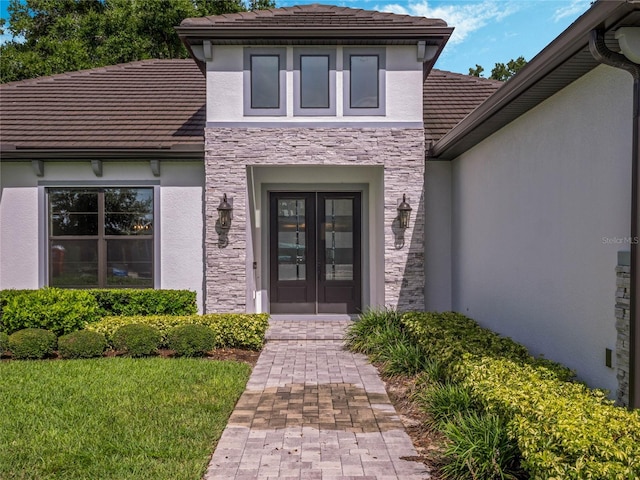 entrance to property featuring french doors