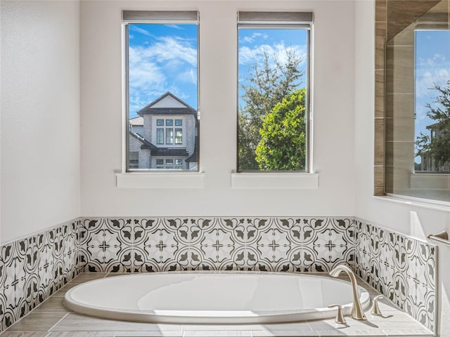 bathroom featuring a healthy amount of sunlight