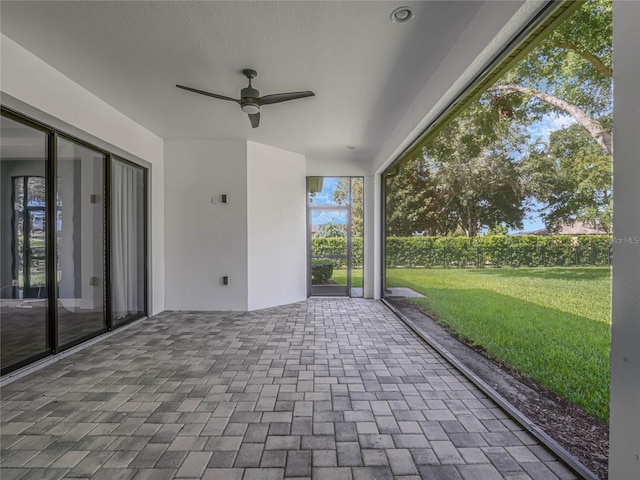 view of patio with ceiling fan