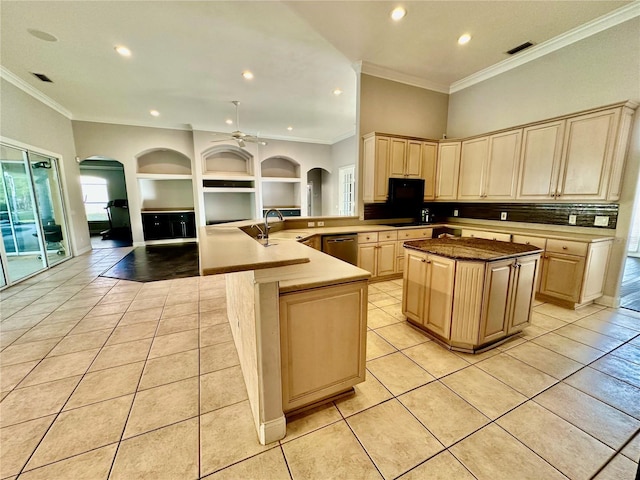 kitchen featuring built in shelves, open floor plan, an island with sink, and light tile patterned floors