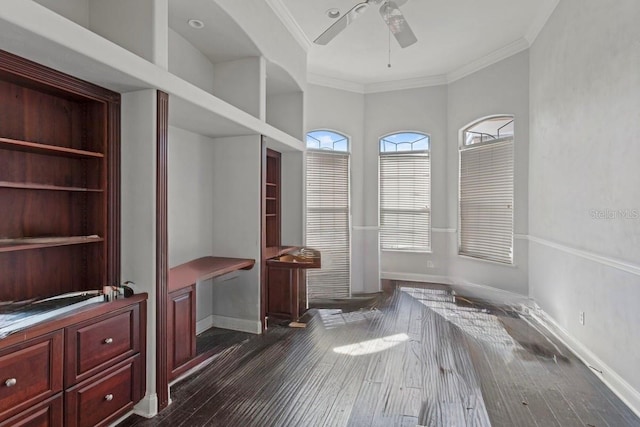 mudroom featuring dark wood-style flooring, crown molding, baseboards, and ceiling fan