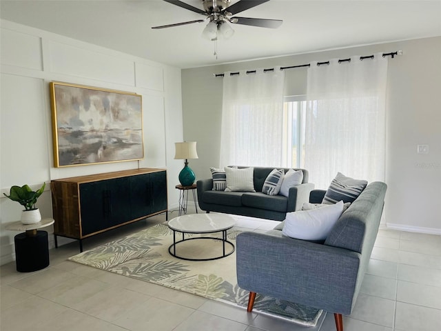 tiled living room featuring ceiling fan