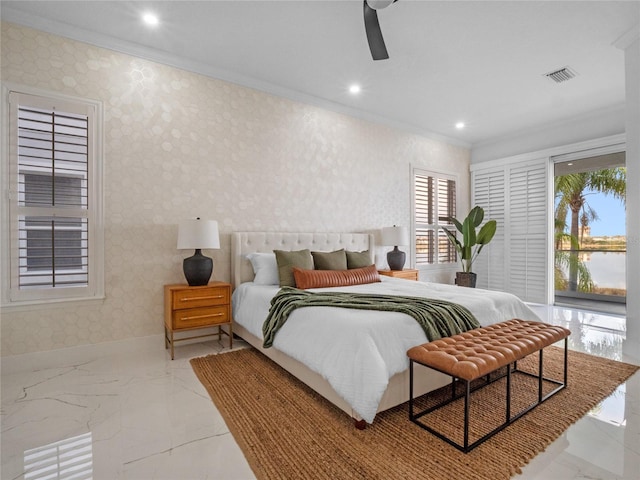 bedroom featuring crown molding and ceiling fan