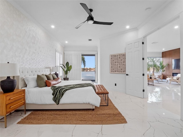 bedroom with multiple windows, ornamental molding, and ceiling fan