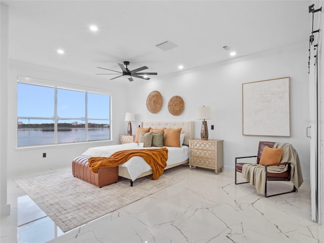 bedroom with crown molding, a water view, and ceiling fan