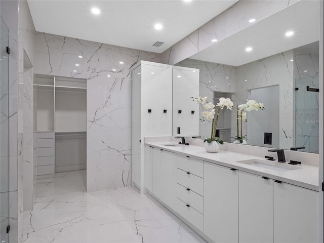 bathroom with vanity and walk in shower