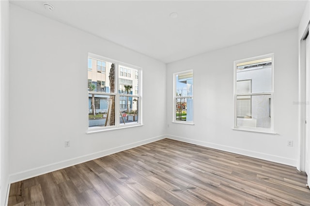 unfurnished room featuring light wood-type flooring