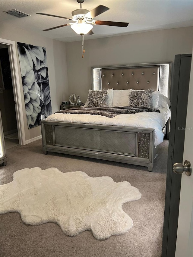 bedroom with carpet and ceiling fan