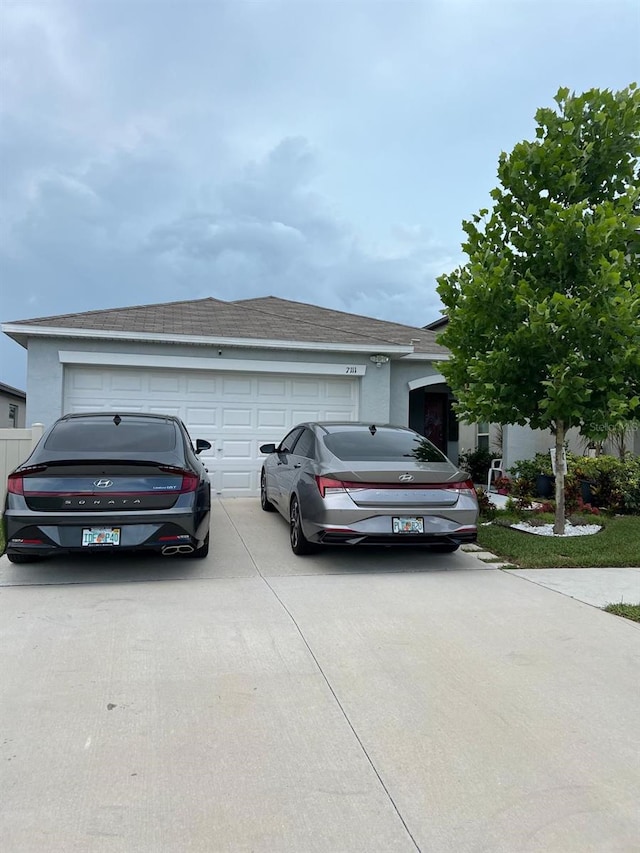 view of side of property featuring a garage