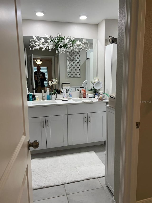 bathroom with vanity and tile patterned flooring