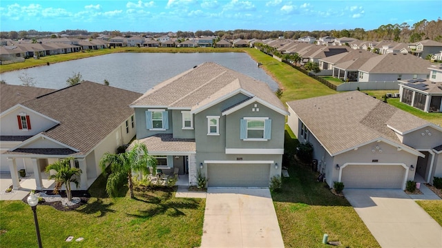 bird's eye view with a water view