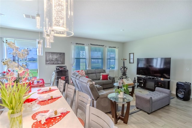 living room with light hardwood / wood-style floors