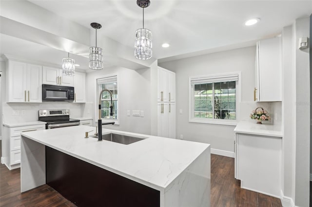 kitchen featuring white cabinetry, sink, decorative light fixtures, and stainless steel electric range oven