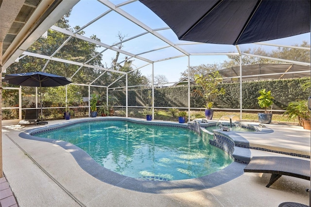 view of pool with an in ground hot tub, glass enclosure, and a patio