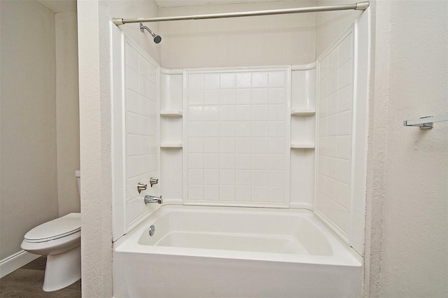 bathroom featuring  shower combination, wood-type flooring, and toilet