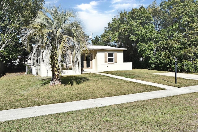 view of front of house with a front lawn