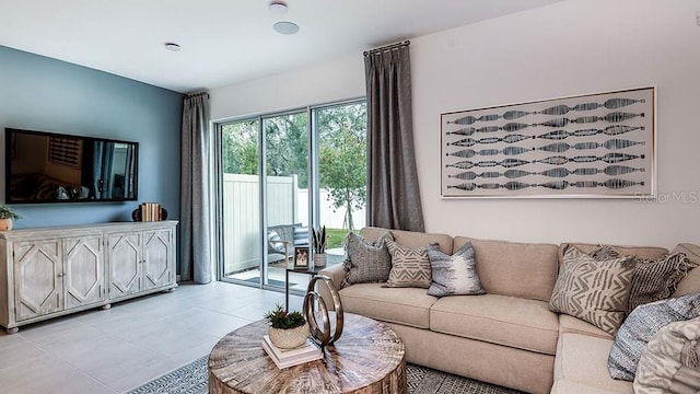 living room featuring light tile patterned flooring