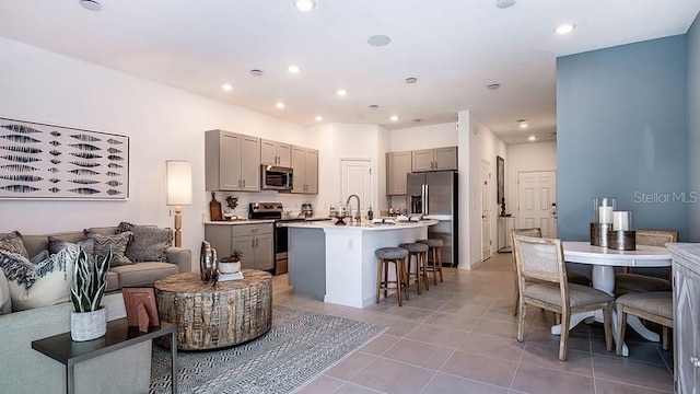 living room with light tile patterned floors