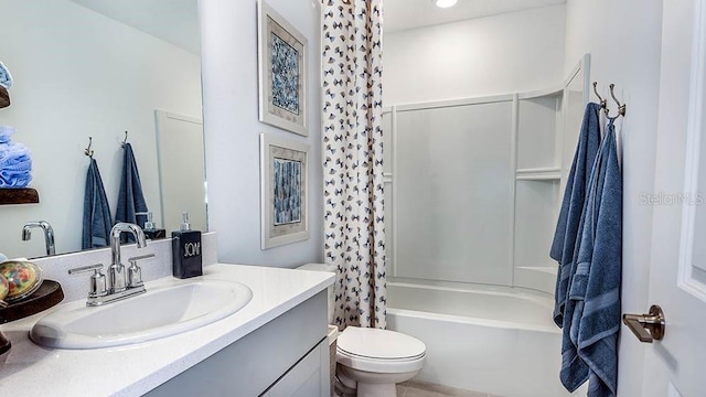 full bathroom featuring vanity, toilet, and shower / bathtub combination with curtain